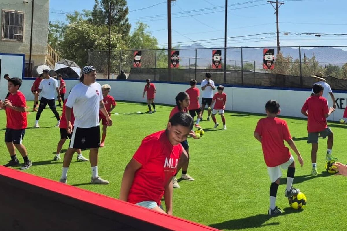 Youth soccer players participating in MLR Soccer fall camp drills